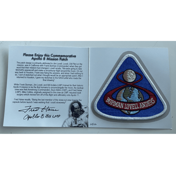 A patch with an Approach & Landing Patch autographed by Fred Haise on it.
